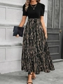 Detail of high-waist floral long dress with puff sleeves and animal print skirt pattern - Snake Pattern