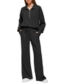 Detail view of black two-piece set featuring half-zip sweatshirt and wide-leg sweatpants - S / Top And Bottom / Black