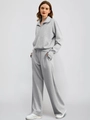 Close-up of light grey knit fabric on two-piece half-zip sweatshirt and wide-leg joggers - S / Light Gray