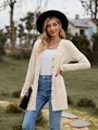 Detail of ribbed knit texture on long-sleeve oatmeal cardigan with amber buttons - Apricot