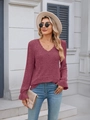 Detail of V-neckline with delicate lace trim and ribbed knit texture on a long sleeve top - Purplish Red