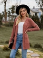 Close-up of rust red ribbed knit cardigan showing V-neckline and wooden buttons detail - S / Brick Red