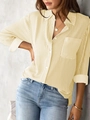 Detail shot of yellow and white vertical striped long sleeve shirt with front pocket - Apricot