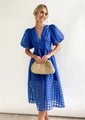 Detail of royal blue V-neck dress with lantern sleeves and textured lattice fabric - Navy Blue