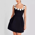 Elegant black sleeveless mini dress featuring 3D white floral appliqués and A-line skirt - S / Black With White Flowers