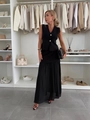 Dettaglio dell'elegante gonna lunga a pieghe nera e del gilet in un guardaroba di lusso - Taglia S / Top E Pantaloni / Nero