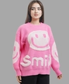 Detail of pink knitted sweater showing fuzzy white smiley face and smile lettering - S / Pink