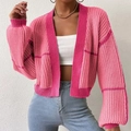 Detail of color-block knit cardigan featuring ribbed cuffs and pink paneled design - XL / Pink