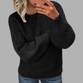 Vue détaillée d'un pull noir à col rond pour femme avec des motifs de tricot en nid d'abeille - S / Noir