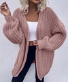 Detailed view of the chunky knit pattern and lantern sleeve on this oversized cardigan - S / Pink