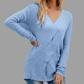 Detail of light blue V-neck knit sweater featuring a cross-wrap design and ribbed cuffs - Sky Blue