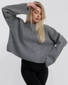 Close-up detail of grey oversized knit sweater showing soft fabric texture and ribbed cuffs - S / Gray