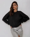 Close-up of black crew neck knit sweater featuring textured ribbed fabric and drop shoulders - S / Black
