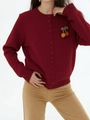 Detail of burgundy knit cardigan with embroidered cherry patch and ribbed cuffs - One Size / Burgundy