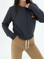Detail of grey knitted cardigan with 3D cherry embroidery and matching buttons - One Size / Dark Gray