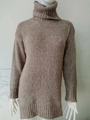 Close-up of the ribbed turtleneck and knit texture on this oatmeal brown sweater - S / Khaki
