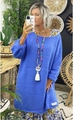 Close-up of oversized Klein blue chunky knit sweater with round neck and brand tag - Sky Blue
