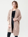 Dettaglio del cardigan a maglia grossa con grandi tasche applicate e trama a maglia - S / Rosa