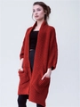 Cardigan lungo da donna in maglia grossa rosso ruggine con tasche e trama a trecce - S / Rosso