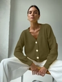 Detail of dark olive V-neck knit cardigan with large buttons and ribbed texture finish - One Size / Tops / Green