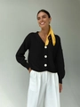 Detail of V-neck black knit cardigan with large white buttons and ribbed texture - One Size / Tops / Black
