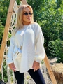 Dettaglio maglione bianco oversize a maglia larga con scollo rotondo e texture - S / Bianco