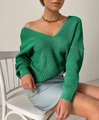 Detail of loose fit dark green V-neck knit sweater with drop shoulder and ribbed cuffs - Green