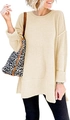 Detail view of beige knit sweater showing side split hem and ribbed texture on cuff - M / Beige