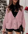 Chic pink knit cardigan with V-neck and pockets for women in a festive cozy setting - Pink