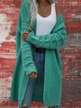 Dettaglio del cardigan in maglia grossa verde pavone con motivi traforati sulle maniche - S / Verde