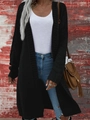 Dettaglio della trama a maglia del cardigan lungo nero con sfondo industriale urbano - S / Nero