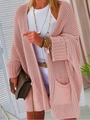 Dettaglio del cardigan rosa a maglia grossa con tasche frontali e vestibilità ampia - S / Rosa