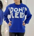 Close-up of klein blue sweater featuring white plush textured DON'T SLEEP lettering - S / Blue