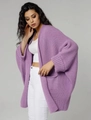 Close-up of a purple chunky knit cardigan with batwing sleeves and large front pockets - Violet