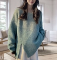 Dettaglio del maglione oversize verde acqua con trama spessa e spacco laterale moda - S / Verde