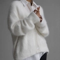 Close-up of white mink cashmere V-neck cardigan with soft fluffy texture and buttons - S / Tops / White
