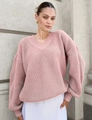 Detail view of pink V-neck knit sweater with thick texture and relaxed dropped shoulders - S / Pink