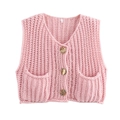 Close-up of pink cable knit vest featuring vintage gold buttons and front pockets - S / Pink