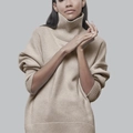 Women's loose turtleneck beige knit sweater with ribbed cuffs and drop shoulder - S / Khaki