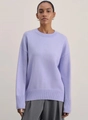 Detail of lavender crewneck knit sweater with ribbed cuffs and loose drop shoulder design - S / Light Purple