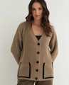 Detail of V-neck knit cardigan with contrast pockets and large black buttons - Camel