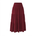 Detailed close-up of smocked high waist and textured fabric on burgundy tiered maxi skirt - S / Burgundy
