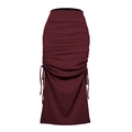 Detail view of burgundy ribbed knit midi skirt featuring side drawstring ruched design - S / Burgundy