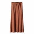 Detail of high-waisted satin maxi skirt featuring adjustable drawstring waist and silk texture - Brown
