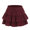 Detalle de minifalda burdeos con volantes, tejido de lunares suizos y cintura con cordón - S / Rojo