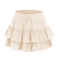 Detailed view of beige layered ruffle mini skirt with swiss dot fabric and elastic tie waist - Beige