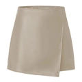 Close-up detail of high-waist khaki PU leather wrap mini skirt with smooth faux leather texture - Beige