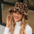 Close-up of leopard print faux fur bucket hat showing soft plush texture and warmth - One Size / Yellow Leopard