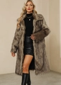 Detail view showing soft brown faux fur texture and collar of women's long coat - 3XL / Camel Faux Fur
