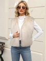 Outdoor street style shot of a beige faux fur vest paired with white long sleeve top - S / Apricot